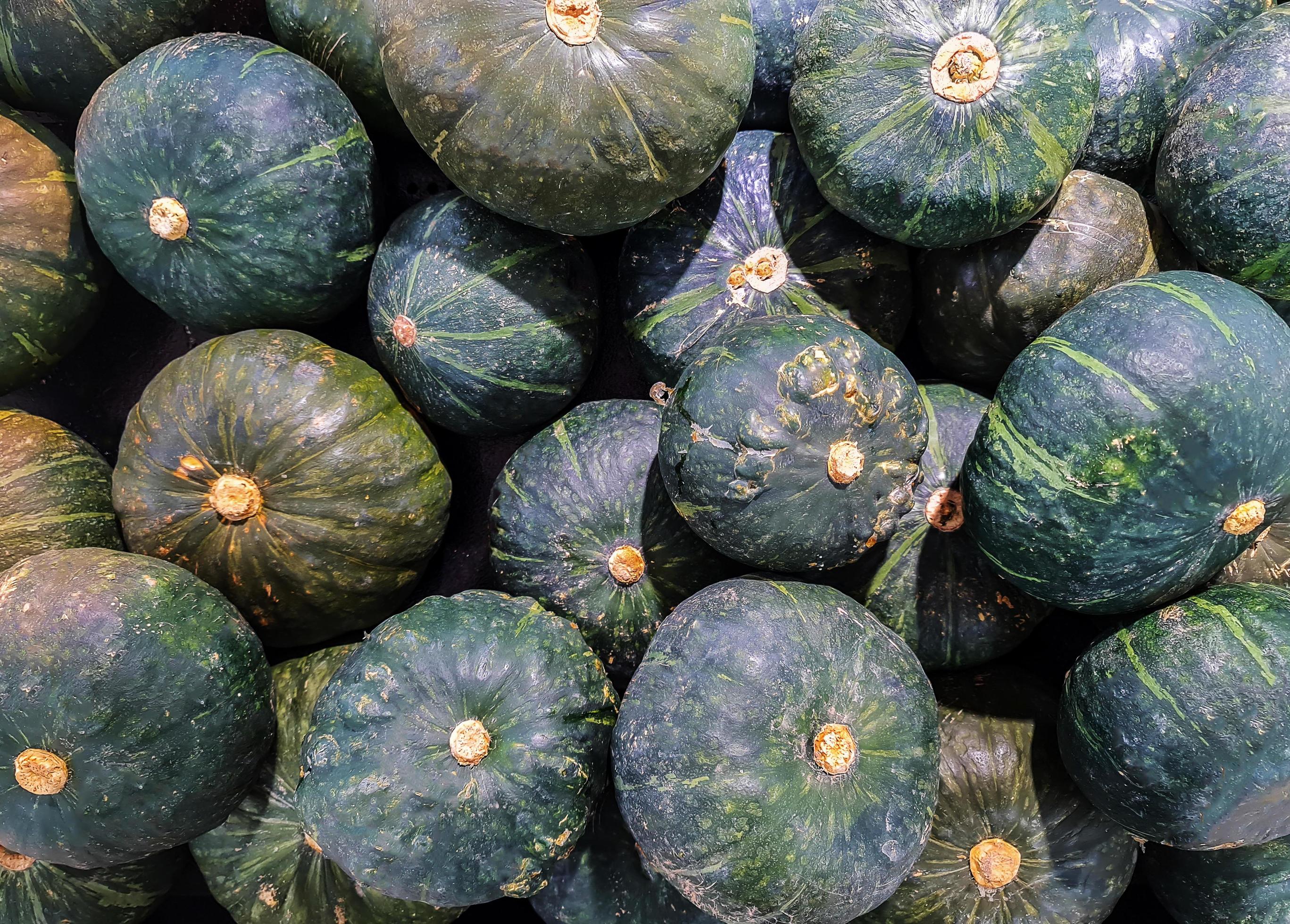 /storage/photos/30/fresh-green-pumpkins-on-a-basket-at-supermarket-free-photo.jpg